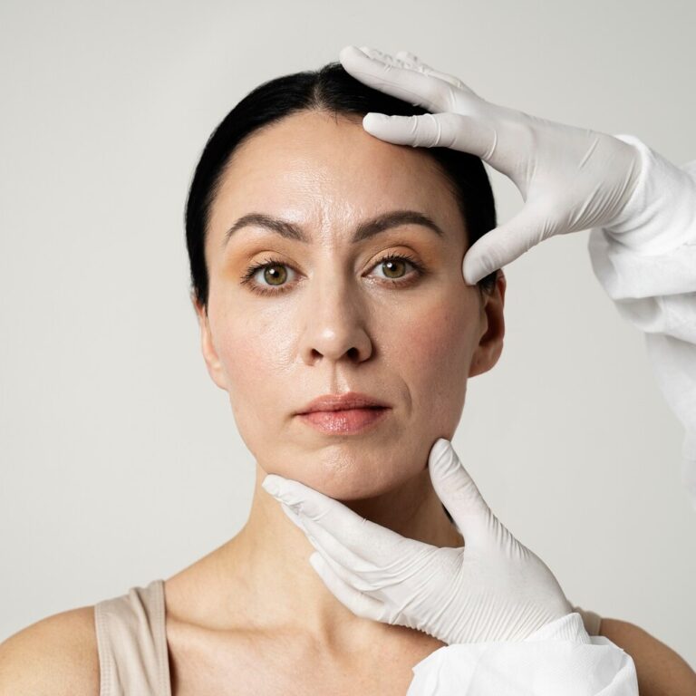front-view-hands-holding-woman-s-head_23-2149349929